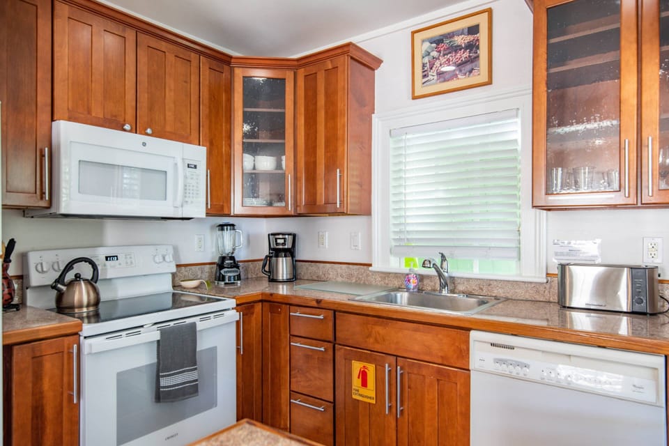 The nicely appointed kitchen is both stylish and convenient, offering everything you need for easy meal preparation during your stay.