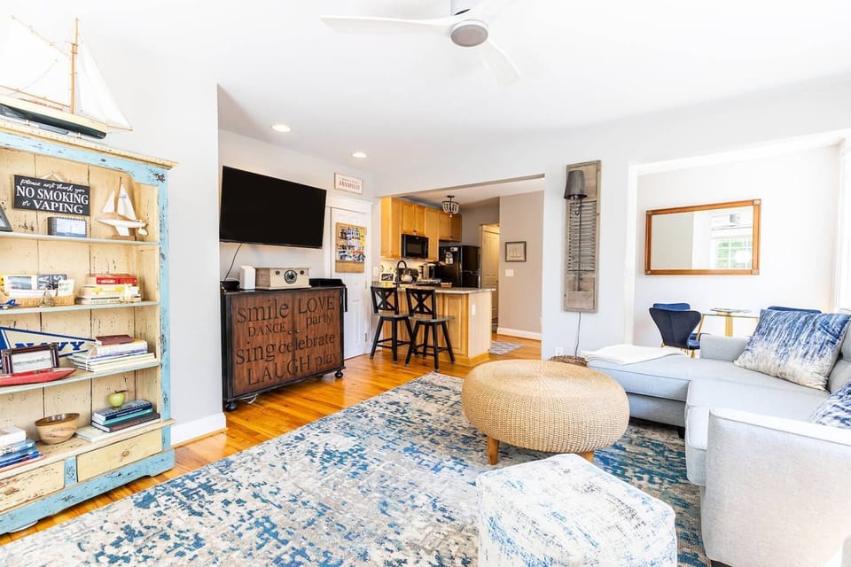 The Schooner includes the 1st floor and 2nd floor units.  The cozy living space on the 1st floor of this Historic 3-unit building.