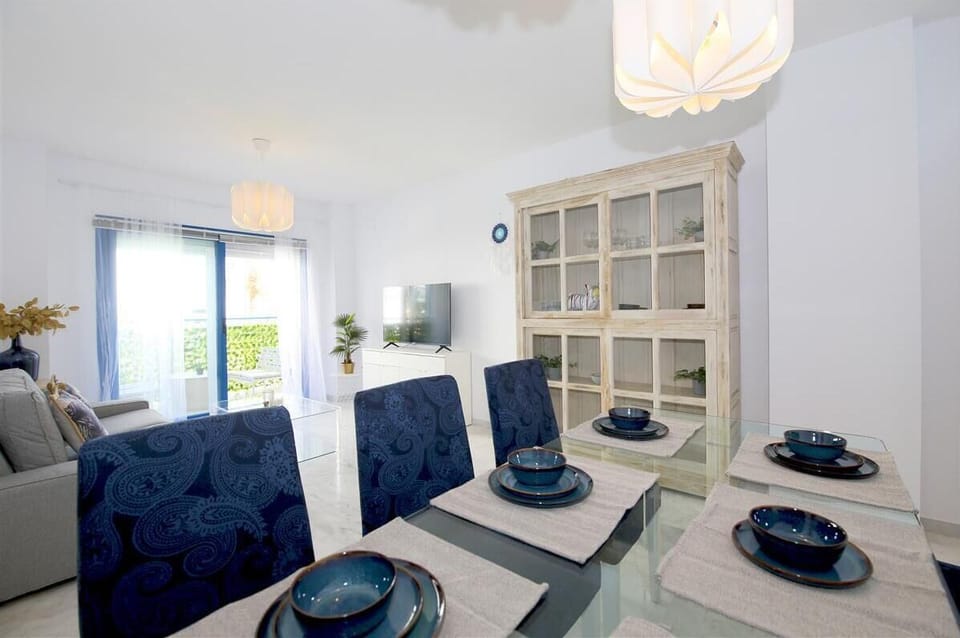 Lovely dining area for six guests on a side of the lounge
