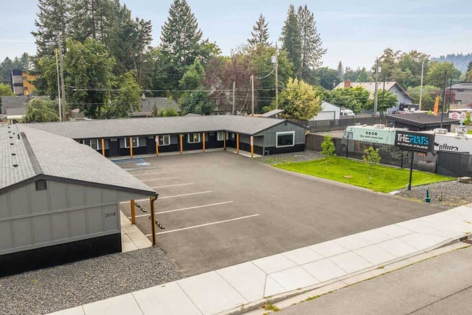 Free parking in the lot with additional free street parking on the east side of the building