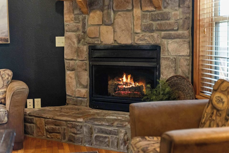Cozy up by the fireplace on a cool evening!