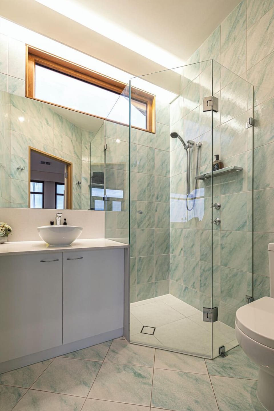 Ensuite bathroom with private shower and toilet