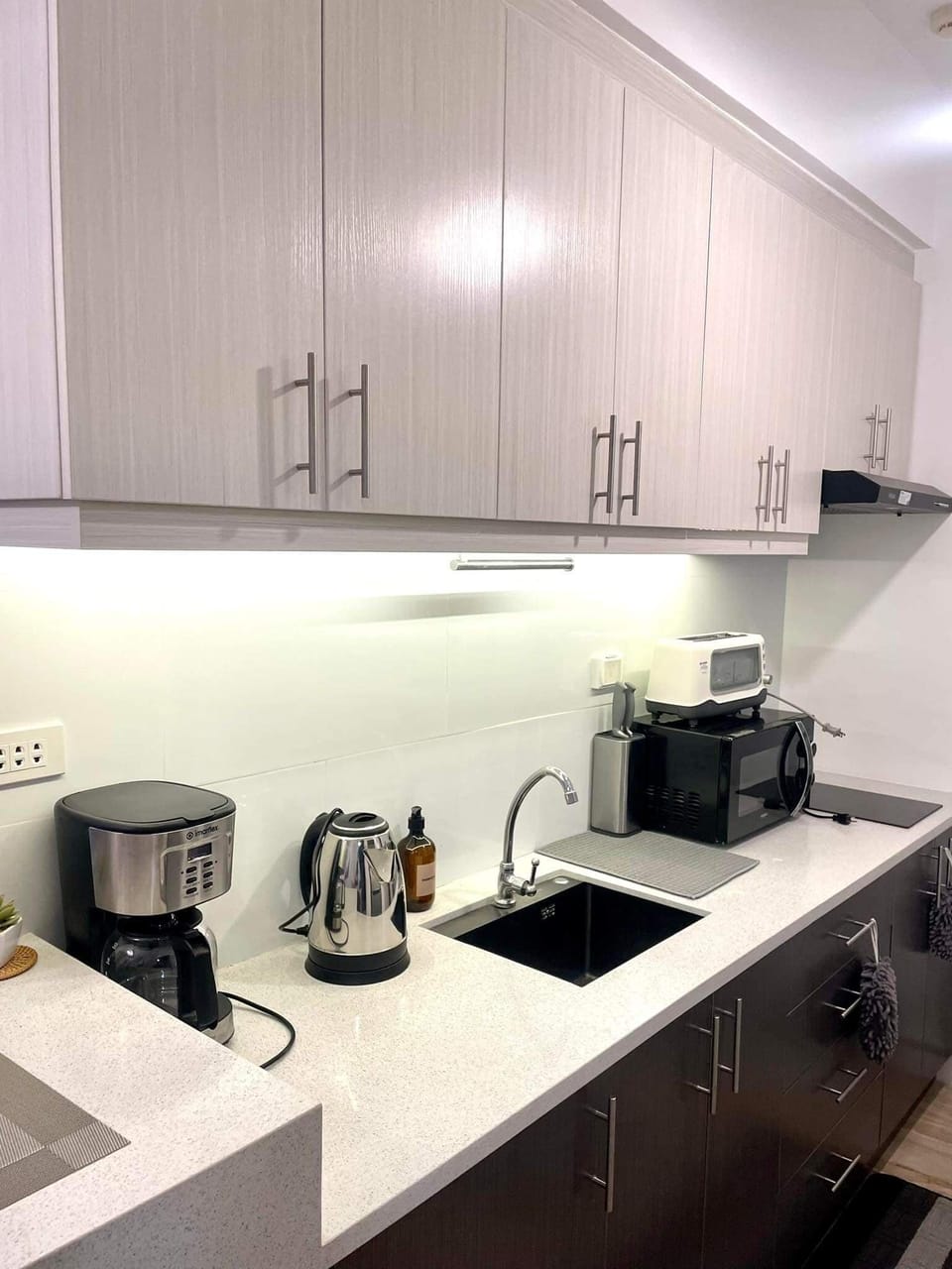 - coffee maker 
- hot water kettle
- toaster
- microwave
- 2 induction stoves