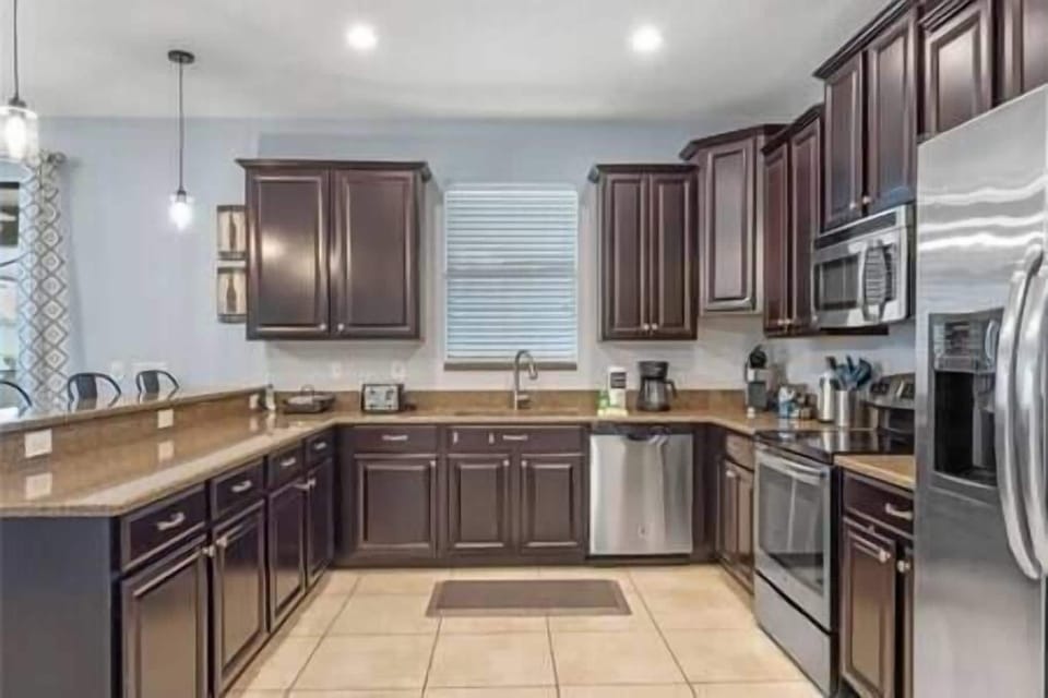 Fully stocked kitchen with all necessary cookware.