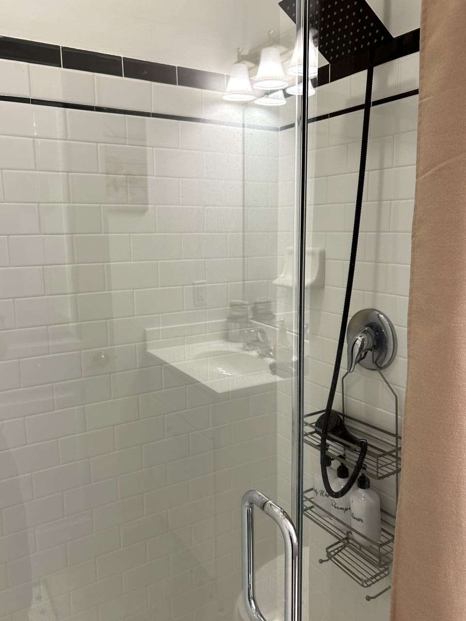 Walk-in shower perfect for refreshing after beach days or exploring the town.