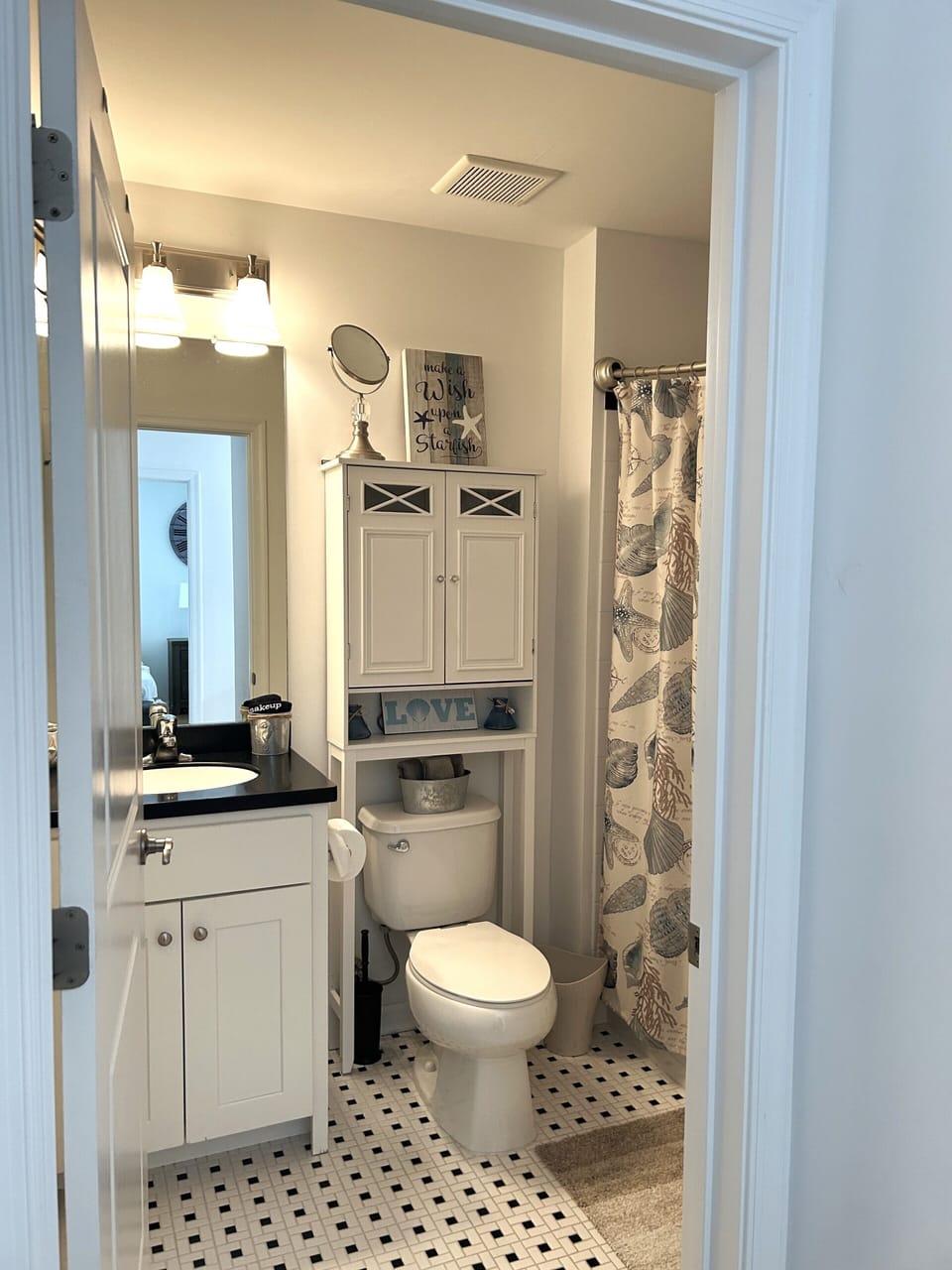 Relax and recharge in this full bathroom on the second floor outside the bedroom