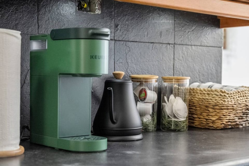 Complimentary coffee pods, tea bags and water. Eletric kettle is available to heat water!