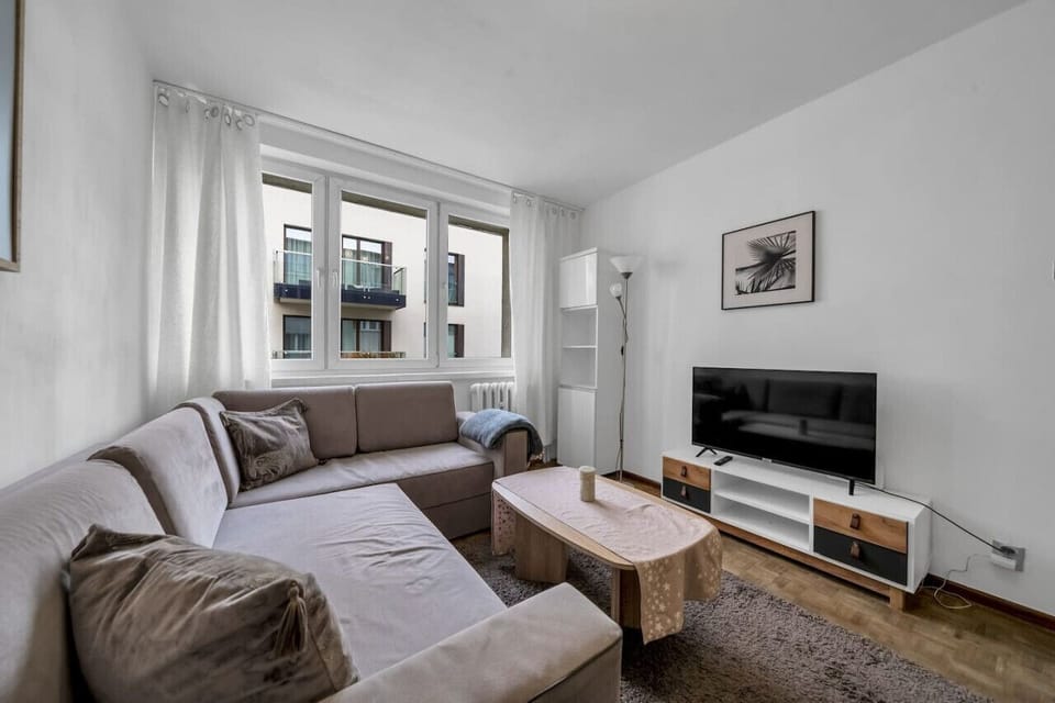 Comfortable Living Room with Sofa Bed and Smart TV | Book Now with RENTUJEMY