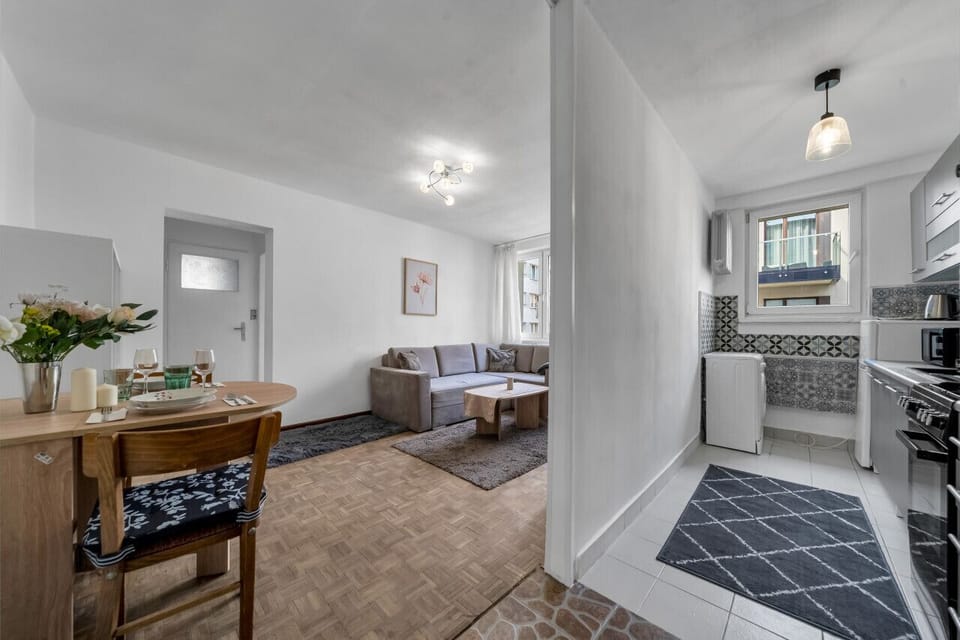 Comfortable Living Room with Sofa Bed and Smart TV | Book Now with RENTUJEMY