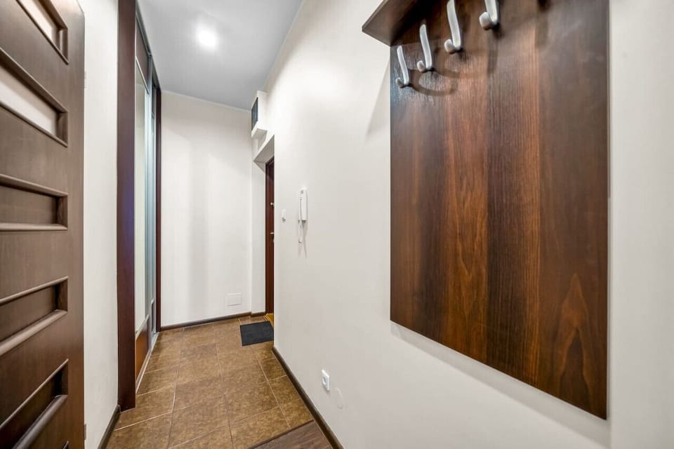 Comfortable Living Room with Sofa Bed and Smart TV | Book Now with RENTUJEMY