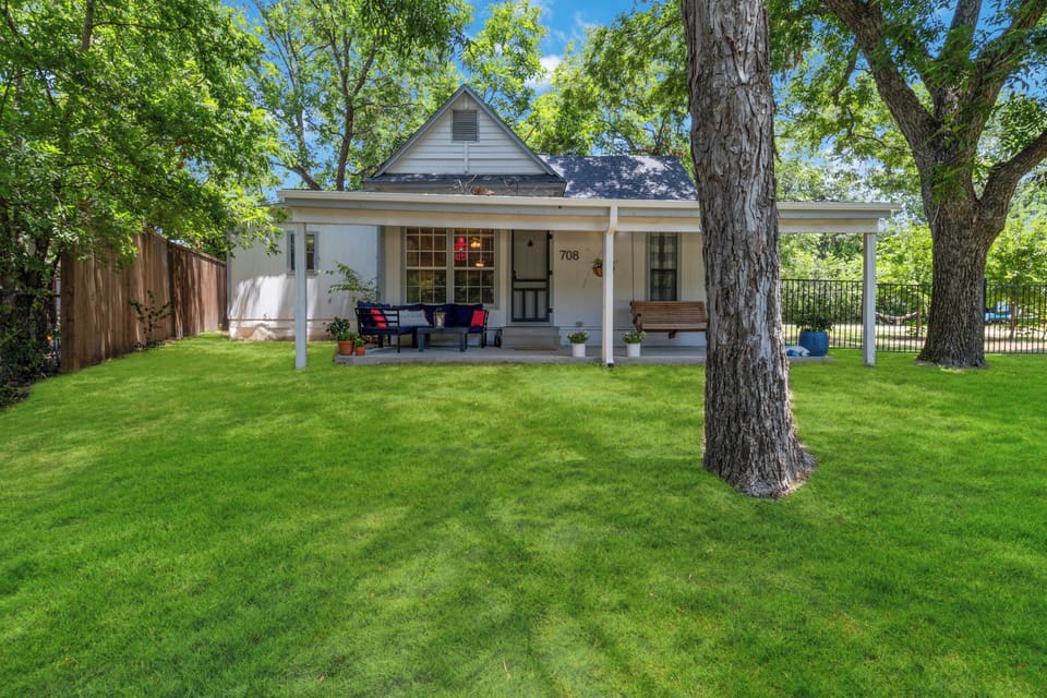 Cozy front porch stays cool, even on warm days.