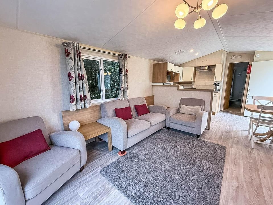 Open the curtains and let in the seaside sun, or snuggle up for a cosy evening together
