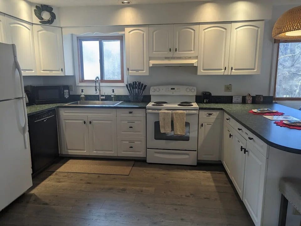 Kitchen that opens to the dining room and living room.