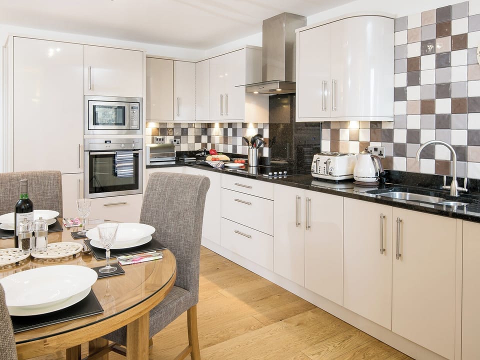Dining area with solid wooden floors | Spindrift, Seahouses