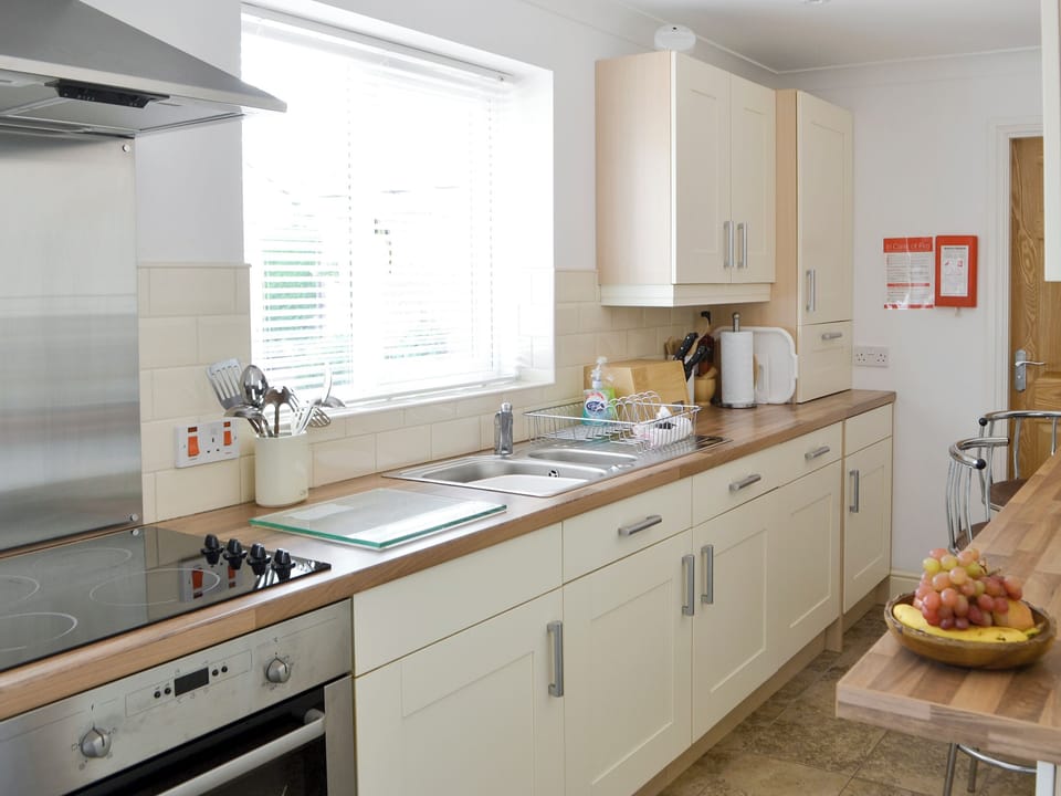 Well-equipped fitted kitchen | Barkers Cottage, Ellington, near Druridge
