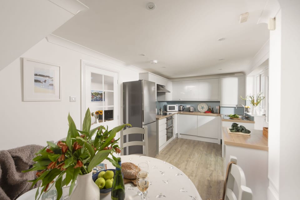 Castaways, Porthtowan. Ground Floor: The beautifully presented open plan kitchen/dining area