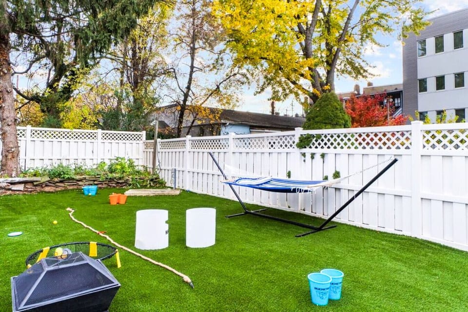 Enjoy a spacious backyard with a cozy hammock and activities for all ages