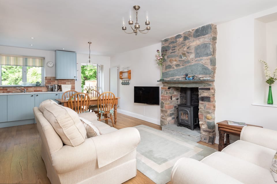 From the hallway you can access this charming open plan living/dining and kitchen area