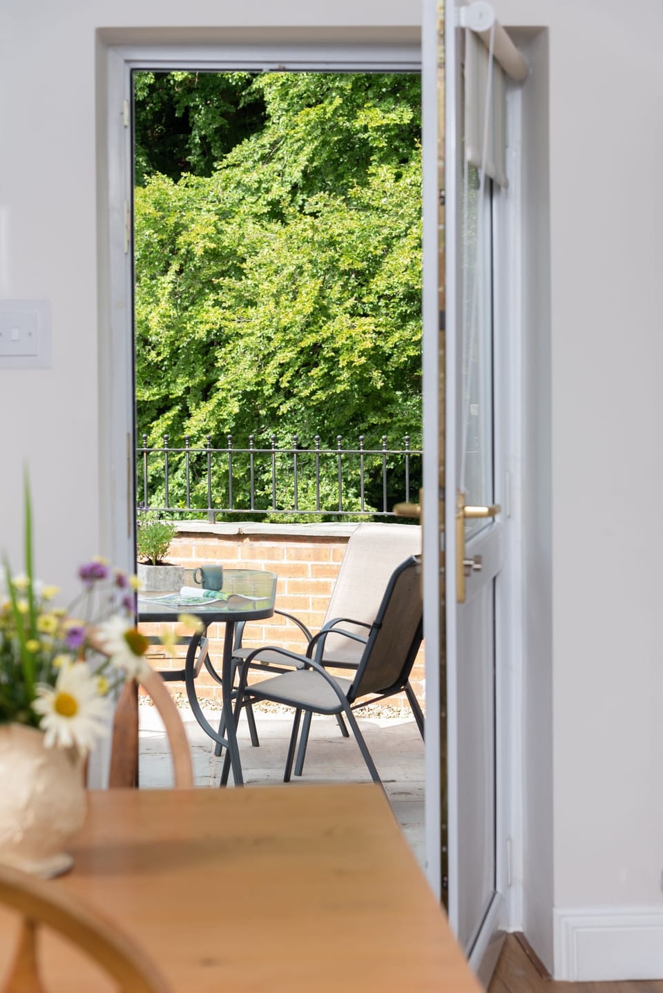 The patio area is a beautiful space for al fresco dinners or to admire the wildlife -  look out for the resident heron!