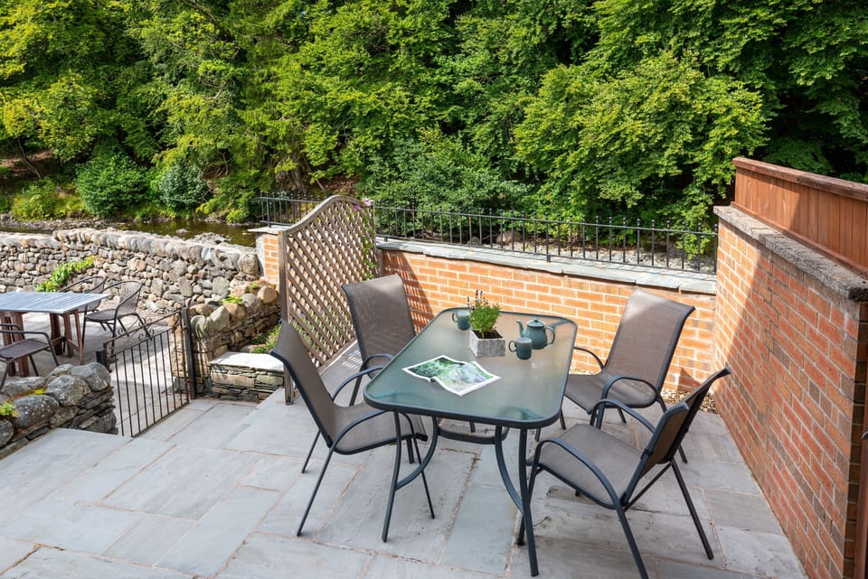 Relax in the patio area, with views to River Greta and local wildlife
