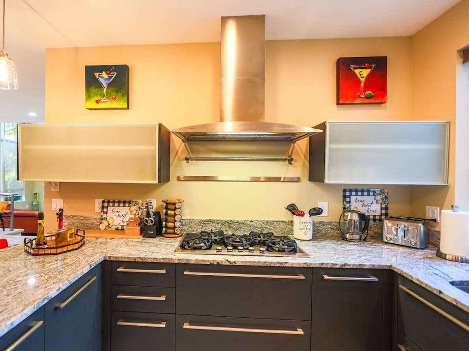 You will Enjoy  Fully Stocked Kitchen with a Lake View