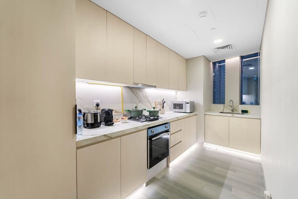 Kitchen: Modern appliances await your culinary adventures in this sleek, stylish space!