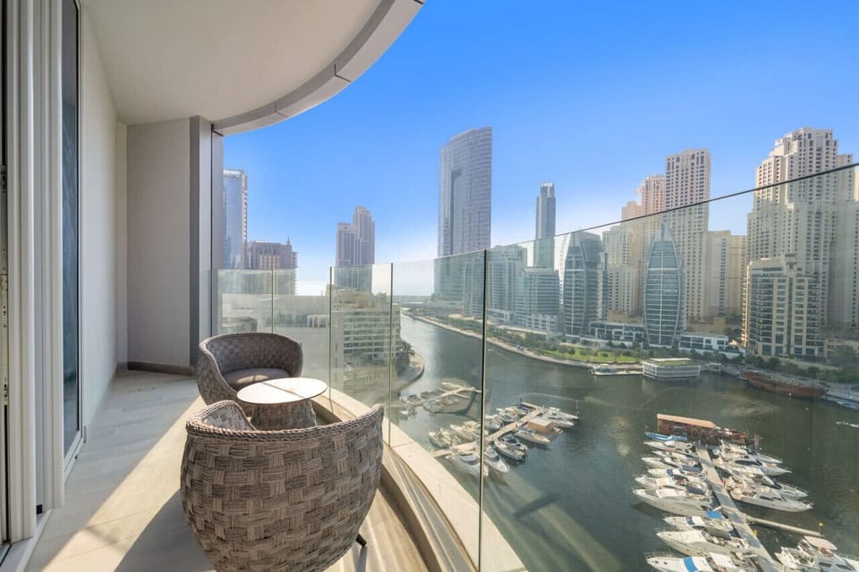 Balcony Oasis: Sip coffee with stunning marina views and embrace Dubai`s skyline chic!