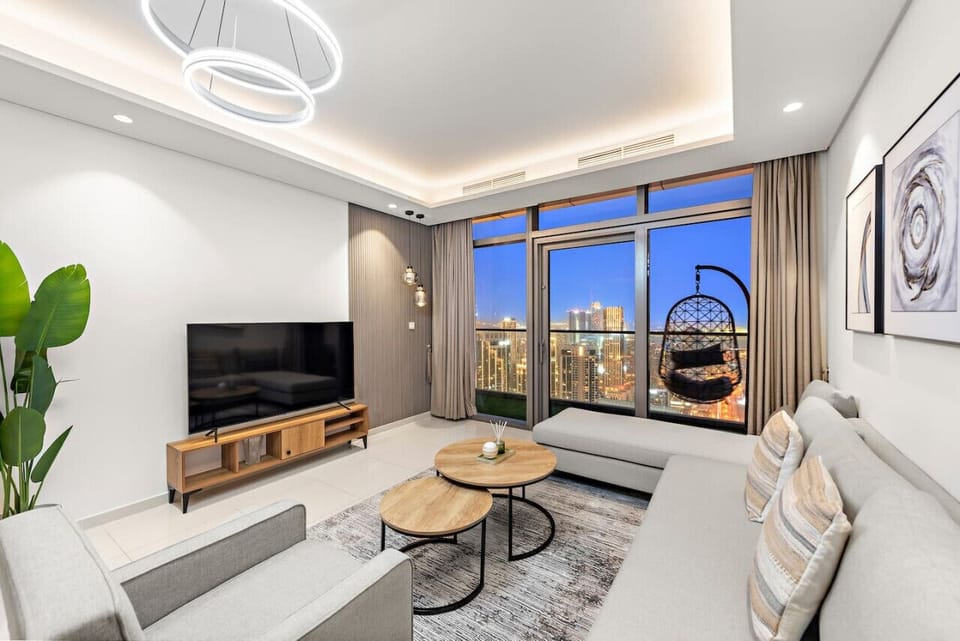 Living Room: Spectacular skyline views from a sleek, modern space designed for relaxation and fun!