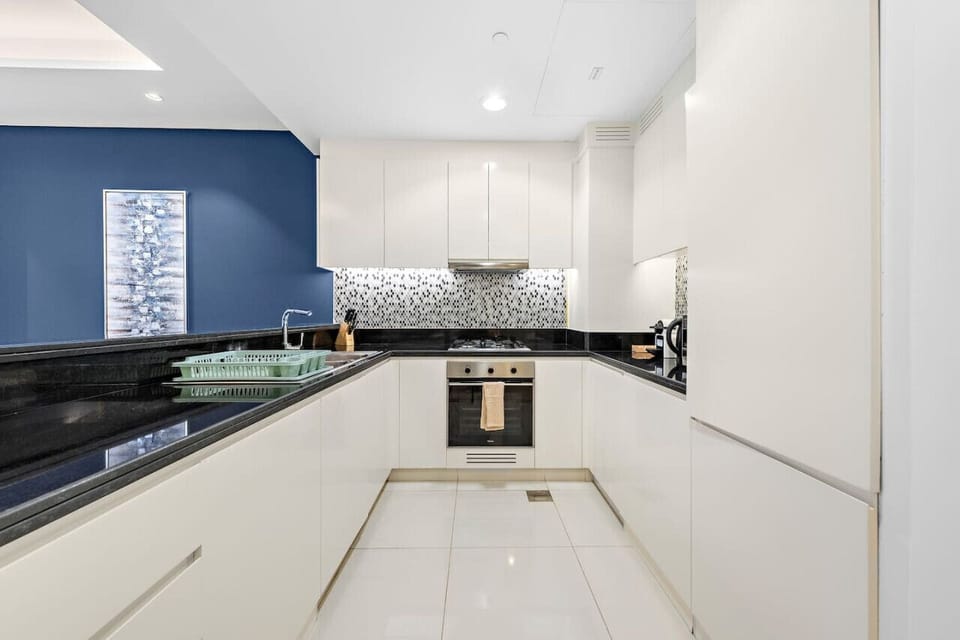 Modern Kitchen: Cook up delicious meals in this sleek, stylish space with chic decor!