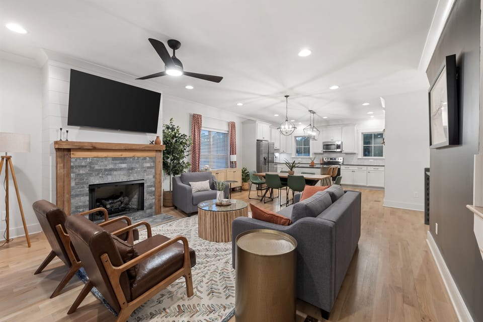 Spacious living room & kitchen with 65" smart tv