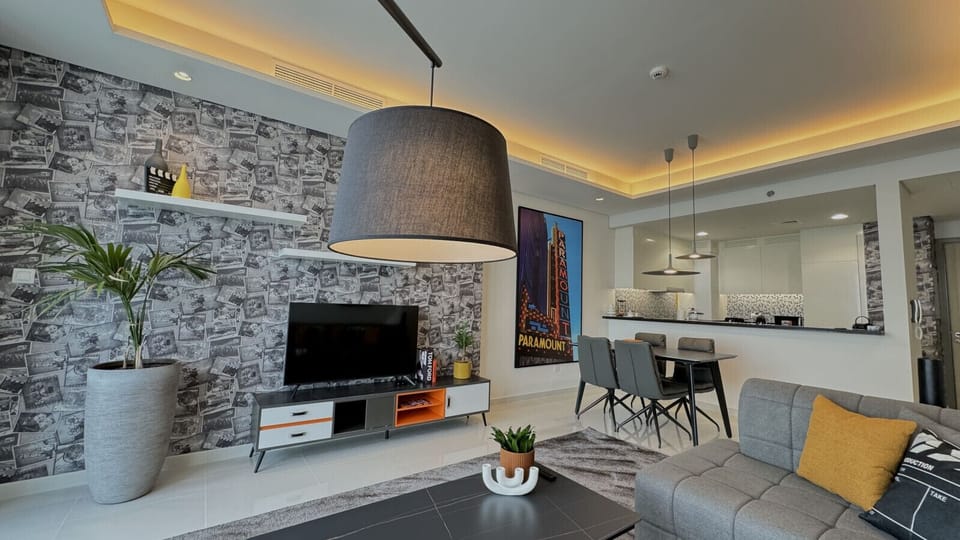 Living room, Dining area and kitchen in the background