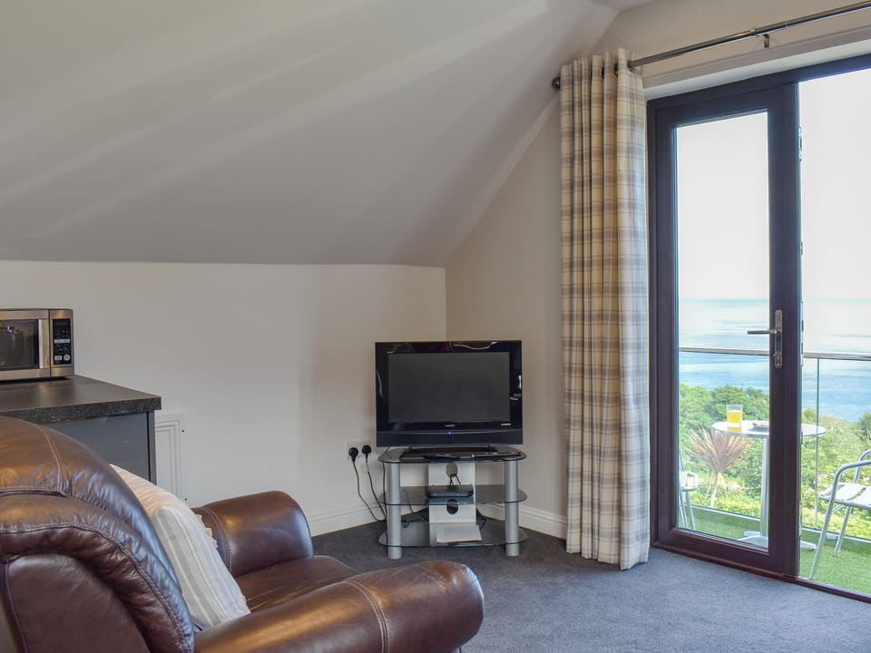 Living area with sea views | Woodlea Cottage 1, Dippen, near Whiting Bay, Isle of Arran