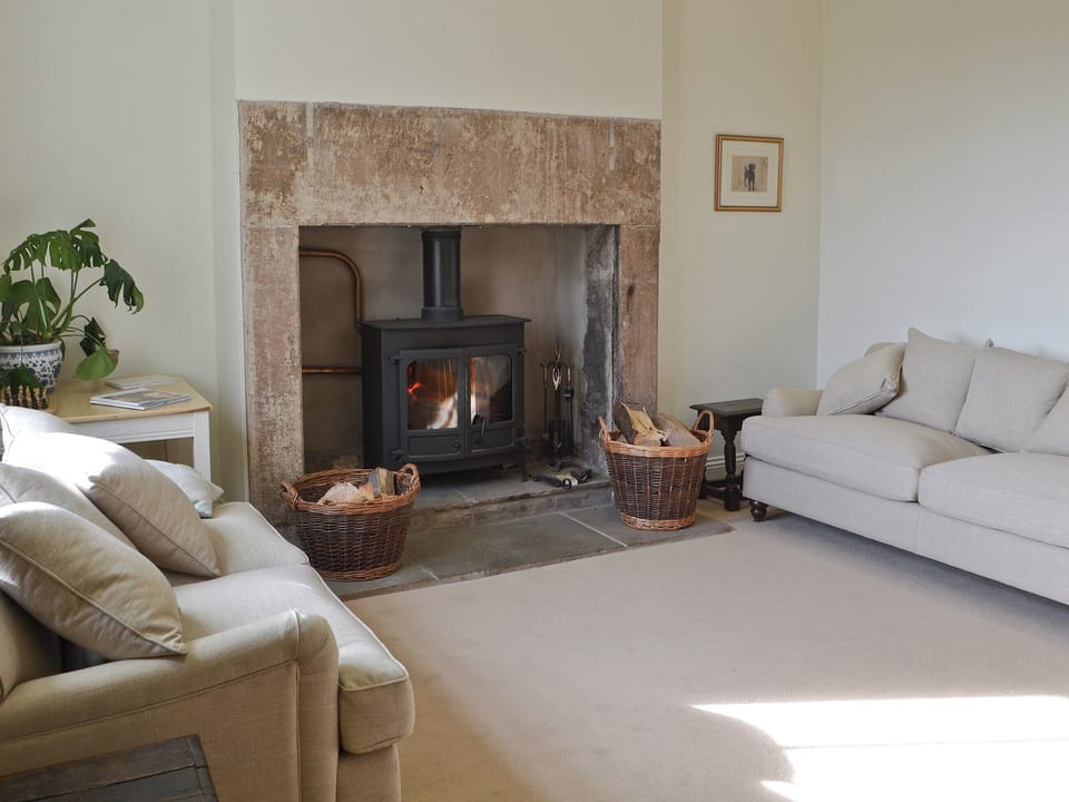 Living room with inglenook fireplace and wood burner | Cragside Cragend CottagesEast Cottage, near Cragside, Rothbury