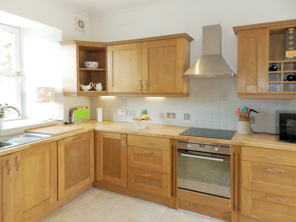 Well-equipped fitted kitchen | Torbeg Farm Cottage, Torbeg, near Blackwaterfoot, Isle of Arran