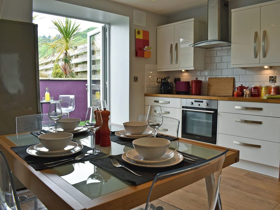 Light and airy kitchen/dining room | 2 Northbank Cottages, Whiting Bay, Isle of Arran