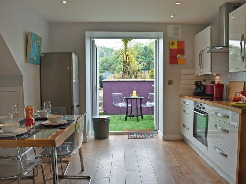 Light and airy kitchen/dining room | 2 Northbank Cottages, Whiting Bay, Isle of Arran