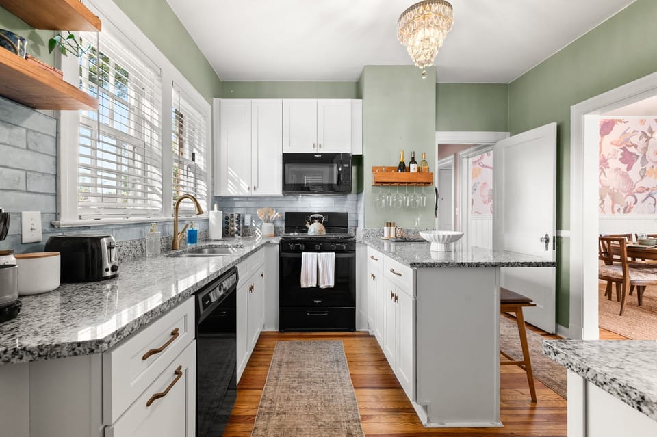 Fully stocked kitchen includes multiple pots and pans, gas range, microwave, dishwasher, icemaker in fridge, tuperware for your leftovers, kids utensils, crockpot, mixing bowls, extra glassware. 