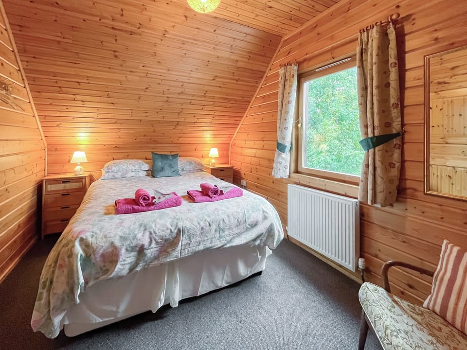 Warm and welcoming double bedroom | Criffel Lodge, Tongland, Kirkcudbright