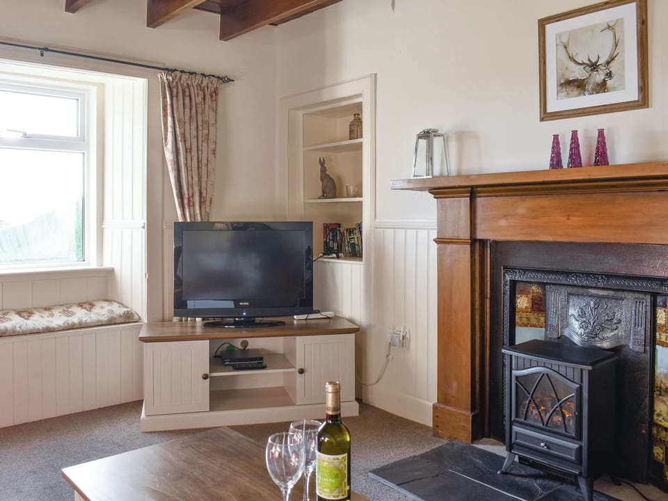 Characterful living area | Mont Stewart Cottage, Whiting Bay, Isle of Arran