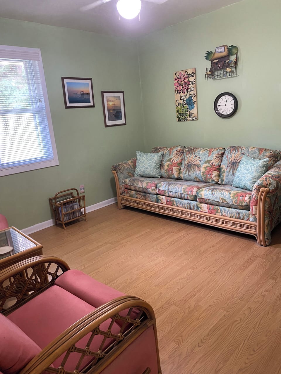 Living room with queen size sleeper sofa, 2 lazy boy recliners, TV w/ ROKU.