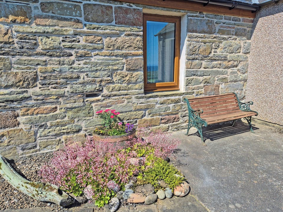 Rockery & patio area | Curlew Croft, North Keiss, Caithness