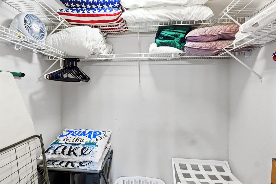 Primary Walk-in Closet
Luggage Racks, laundry basket, iron/board, pillows, etc.