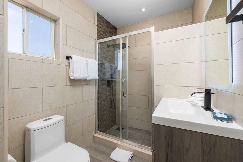 Indulge in the luxurious Master Ensuite Bathroom, complete with modern fixtures, a spacious shower, and elegant finishes. A perfect retreat for ultimate relaxation and convenience right off the Master Bedroom.