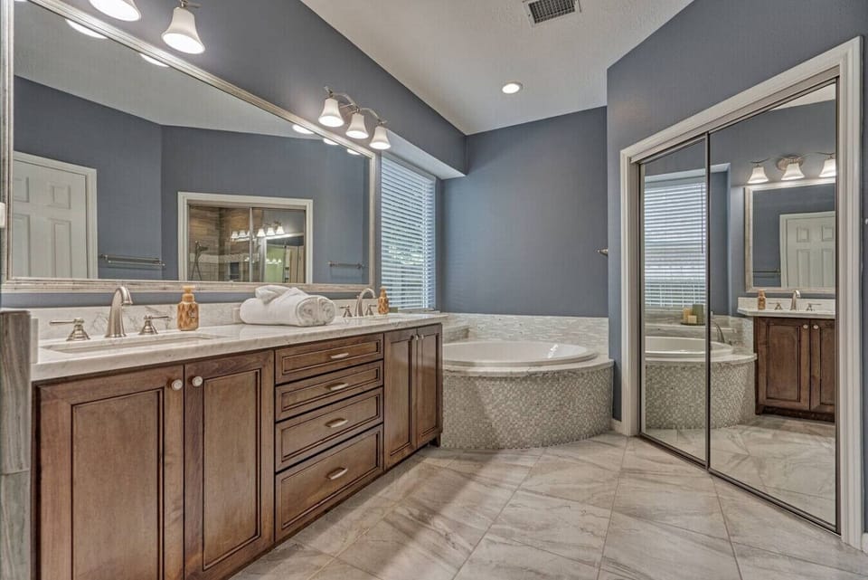 Pamper yourself in the spa-inspired en-suite with a soaking tub.
