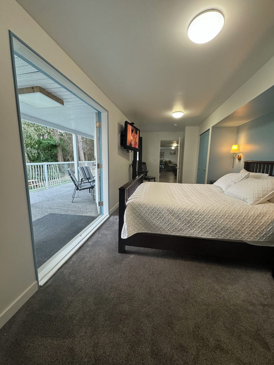 BEDROOM #2 OPENS ONTO PRIVATE DECK WITH LAKE VIEW AND 30 FT WIDE WATERFALL 