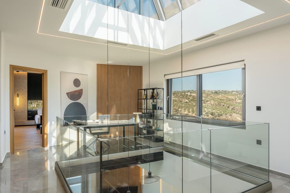 The office area is thoughtfully designed, complete with a printer and tablet