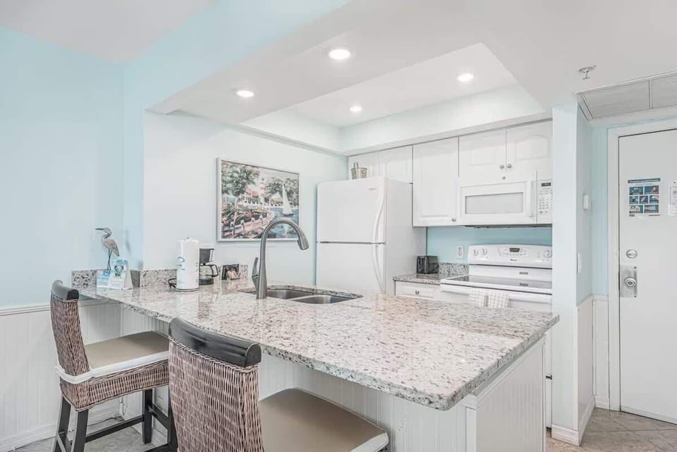 Fully Stocked Kitchen. Blender, Toaster, Waffle iron, Mixer, Coffee maker with drip and k-cup, pots, pans, utensils, dishwasher, cupcake pan, mixing bowls, plates, bowls, mugs, and cups. Children's utensils, plates, cups, and bowls. And more