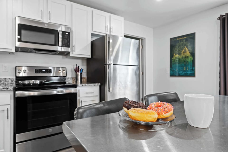 Dining Area: From quick bites to leisurely feasts, this versatile dining area is designed for your comfort and enjoyment.