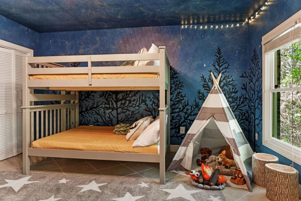 A fun kid`s bedroom downstairs in the home