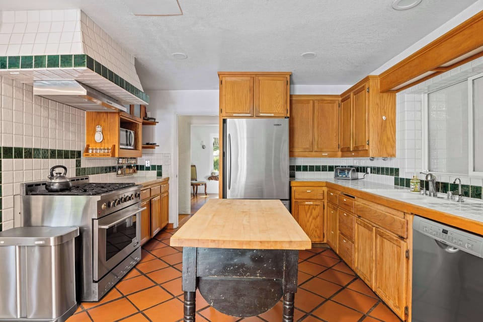 This well-equipped kitchen features a gas range and plenty of counter space—ready for preparing meals with ease.